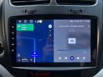 Мултимедия в Dodge Journey с навигация – детайл от реален монтаж, подобрен с AI