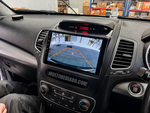 Android мултимедия в Kia Sorento 2013–2014 с включена камера за задно виждане